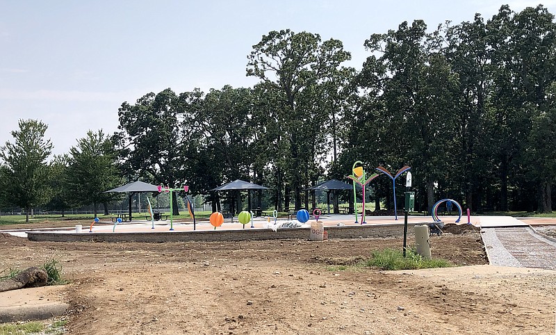 Westside Eagle Observer/RANDY MOLL
The new Gentry splash pad is getting closer to completion with much of the concrete poured and many of the features in place, as seen by this photo on Sunday.