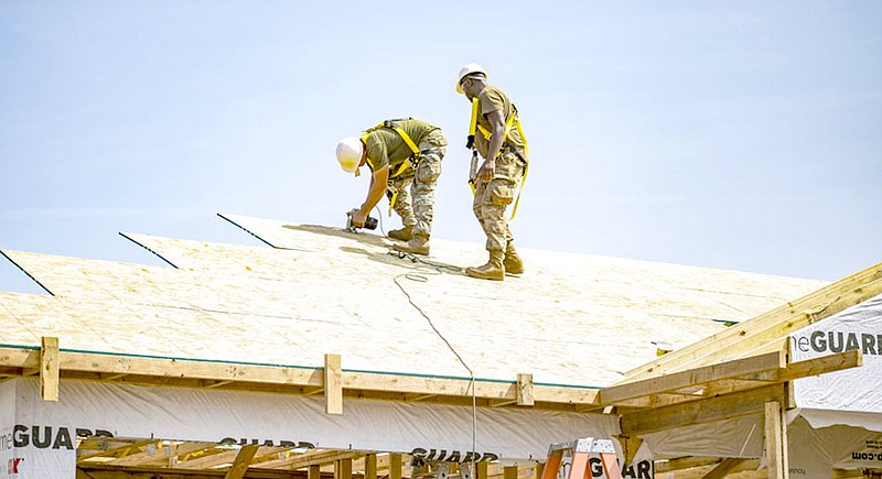 Guardsmen and reservists from 23 different states have worked on the first seven homes since breaking ground in April, with an average of 80 on site at any given time. They have invested 55,000 hours of work so far with a community investment as of July topping $2.5 million.