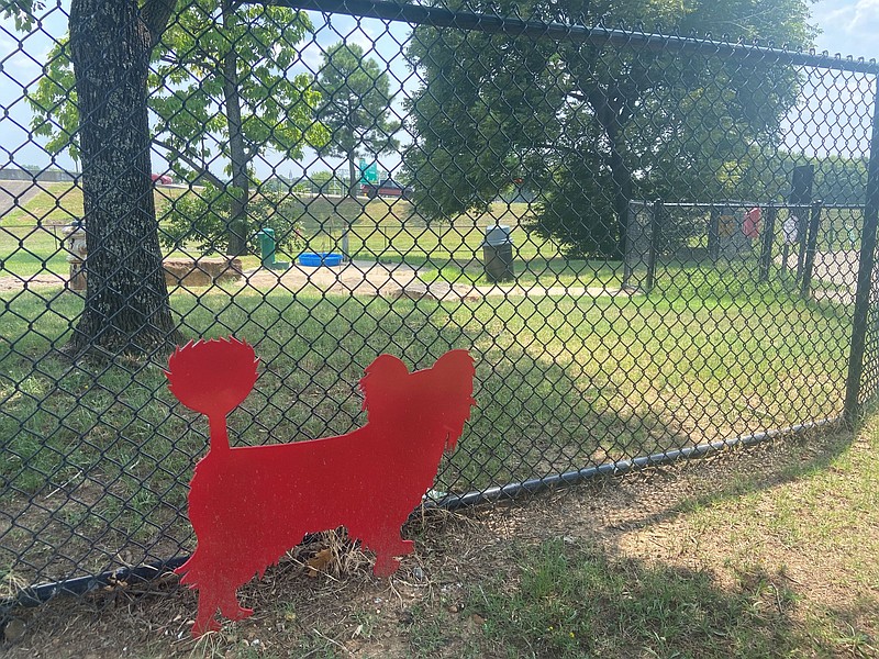 Jeff May, assistant to White Hall Mayor Noel Foster, visited other dog parks including this facility at MacArthur Park at Little Rock. It includes a sally port gate system, with interior and exterior openings, that are designed for safety. May planned a similar design for the White Hall dog park. (Special to The Commercial/Deborah Horn)