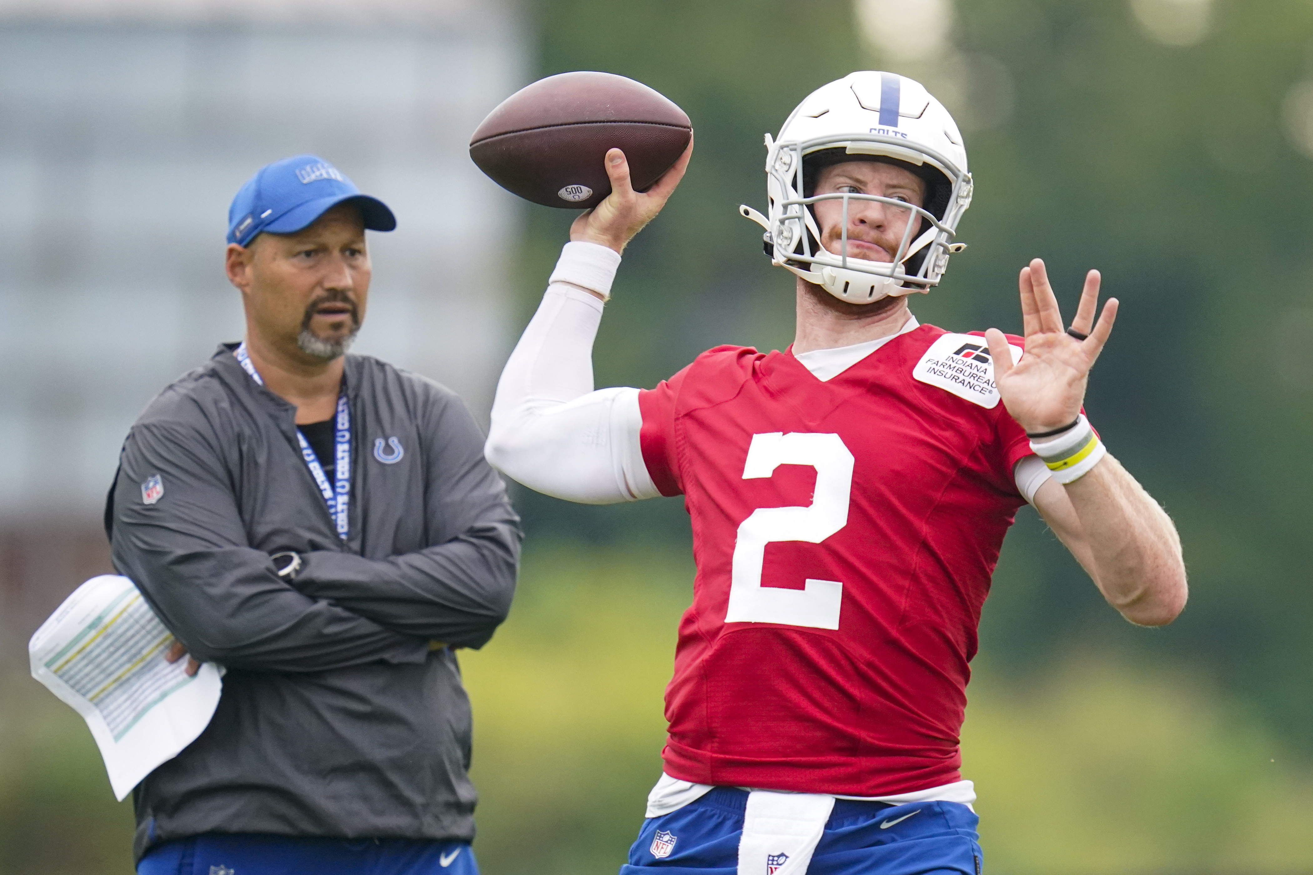 Indianapolis Colts head coach Frank Reich greets corner back T.J.