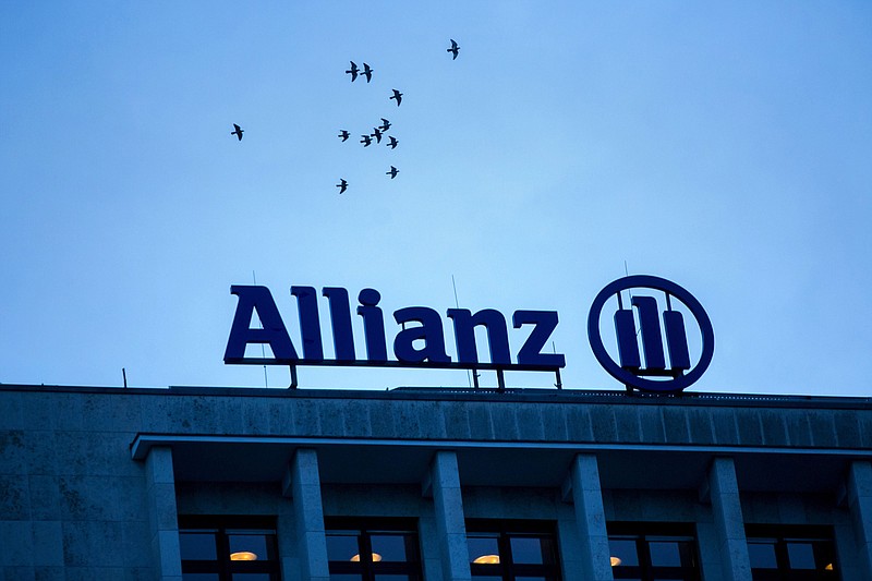 The Allianz SE logo sits on a top of a building in Berlin on Jan. 4, 2017. MUST CREDIT: Bloomberg photo by Krisztian Bocsi