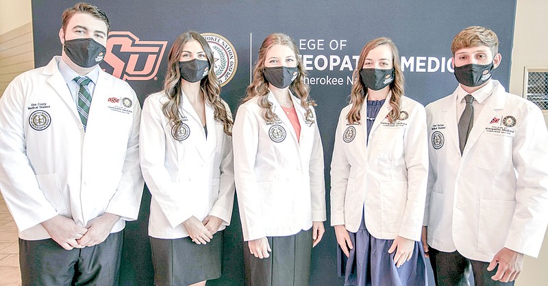 Photo Submitted Cherokee Nation student doctors who recently received their white coats from the OSU College of Osteopathic Medicine at Cherokee Nation include Alex Cosby (left), Breanna Sharp, Megan Tramel, Katherine Cox, and Chet Rotton.