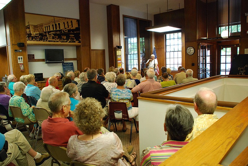 Johnny Jacobs speaks to the Rogers History Club Nov. 25, 2012,in the old post office annex to the Rogers Historical Museum.

(Courtesy photo/James Hales)