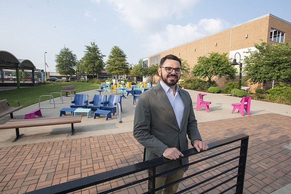 Kevin Flores, seen here in downtown Springdale Aug. 2, 2021, is the first Hispanic person to be elected to the Sprigdale city council. (NWA Democrat-Gazette/J.T. Wampler)