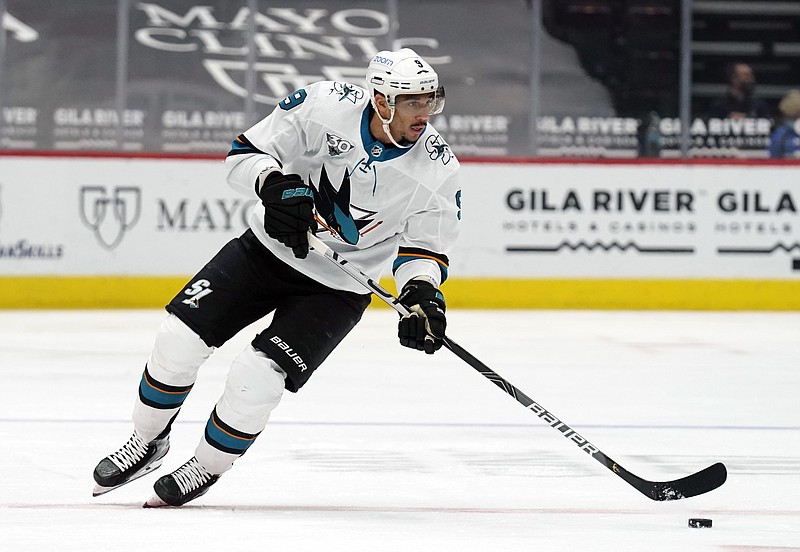 San Jose Sharks left wing Evander Kane moves the puck during the team's March 26 NHL game against the Arizona Coyotes in Glendale, Ariz. The NHL says it will investigate an allegation made by Kane’s wife that he bets on his own games and has intentionally tried to lose for gambling profit. - Photo by Rick Scuteri of The Associated Press