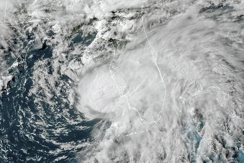 This July 6 satellite image made available by NOAA shows Tropical Storm Elsa in the Gulf of Mexico off the coast of Florida. On Wednesday, the National Oceanic and Atmospheric Administration updated its outlook for the 2021 Atlantic season, slightly increasing the number of named storms and hurricanes expected in what is predicted to be a busy, but not record-breaking year. - NOAA via AP