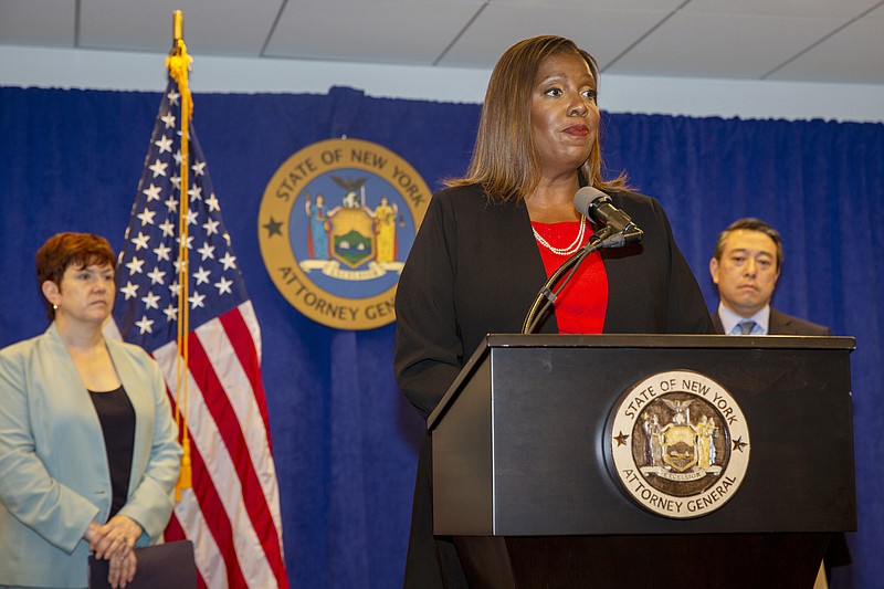 New York State Attorney General Letitia James speaks at a press conference, Tuesday, in New York. An investigation found that New York Gov. Andrew Cuomo sexually harassed multiple women in and out of state government and worked to retaliate against one of his accusers, James announced Tuesday. Attorneys Joon Kim, right, and Anne L. Clark, lead investigators, listen.  - AP Photo/Ted Shaffrey