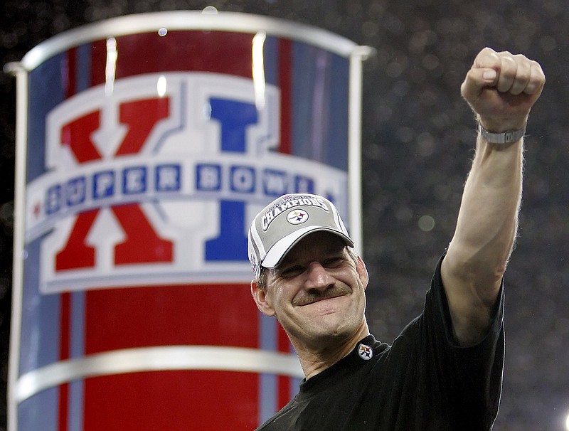 Pittsburgh Steelers head coach Bill Cowher reacts on the center stage on Feb. 5, 2006, after the Steelers’ 21-10 win over the Seattle Seahawks in Super Bowl XL in Detroit. Cowher, who won 149 games and a Super Bowl in 15 seasons with the Pittsburgh Steelers from 1992-2006, will be inducted into the Pro Football Hall of Fame this weekend. - Photo by David J. Phillip of The Associated Press