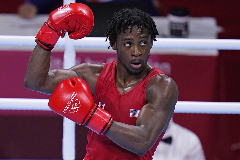 The United States' Keyshawn Davis celebrates after winning a men's lightweight 63-kg quarterfinal boxing match against the Russian Olympic Committee's Gabil Mamedov at the 2020 Summer Olympics Tuesday in Tokyo. - Photo by Frank Franklin II of The Associated Press