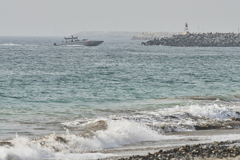 An Emirati Coast Guard vessel patrols off Fujairah, United Arab Emirates, Wednesday, Aug. 4, 2021. The British navy warned of a &quot;potential hijack&quot; of another ship off the coast of the United Arab Emirates in the Gulf of Oman near Fujairah on Tuesday, though the circumstances remain unclear. (AP Photo/Jon Gambrell)