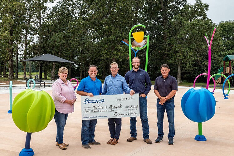 SUBMITTED
Pictured at the August 5 check presentation in Gentry are Janie Parks, executive director of Gentry Chamber of Commerce; Gentry Mayor Kevin Johnston; Simmons CEO Todd Simmons; Simmons Chaplain Nick Braschler; and Simmons CAO Russell Tooley.