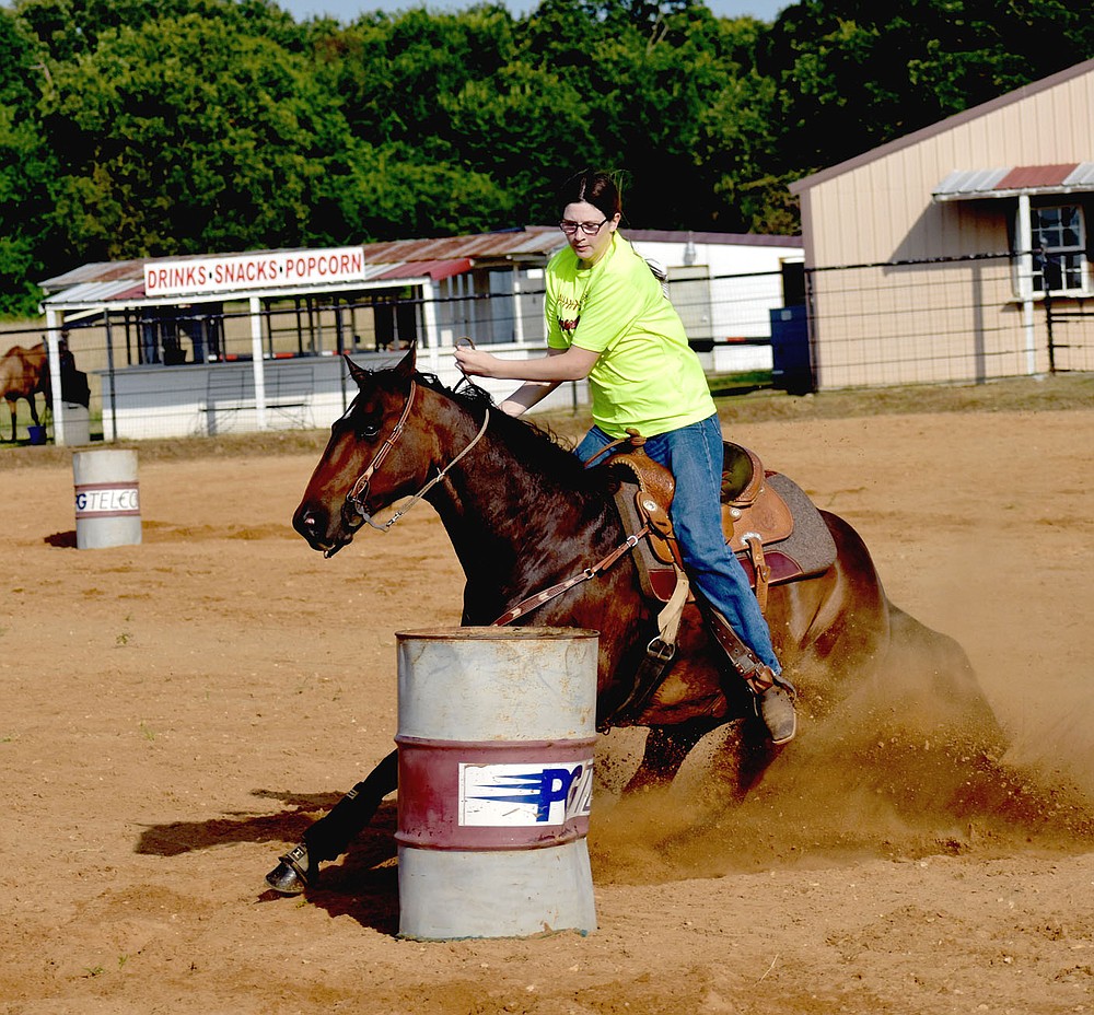 MARK HUMPHREY ENTERPRISE-LEADER/Reigning Lincoln Riding Club junior queen Shania Downing won first place in the July 25 barrel racing competition for the 15-17 age division at the Lincoln Riding Club Play Day with a time of 17.836. Shania and other local junior competitors get a chance to compete at the 68th annual Lincoln Rodeo featuring performances Thursday through Saturday along with a host of other rodeo related activities.