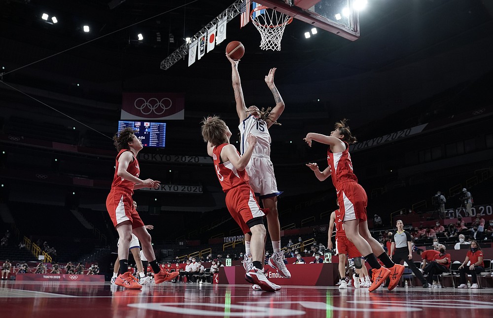 United States' Brittney Griner (15) shoots over Japan's Maki Takada (8) during women's basketball gold medal game at the 2020 Summer Olympics, Sunday, Aug. 8, 2021, in Saitama, Japan. (AP Photo/Eric Gay)