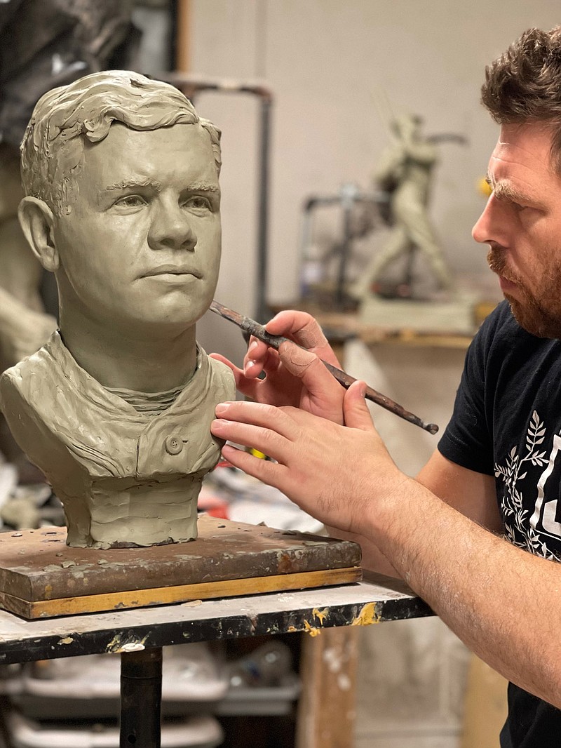 Sculptor Chad Fisher of Fisher Sculpture works on a portrait study for the 8-foot Babe Ruth monument in this undated handout photo from Visit Hot Springs. - Submitted photo