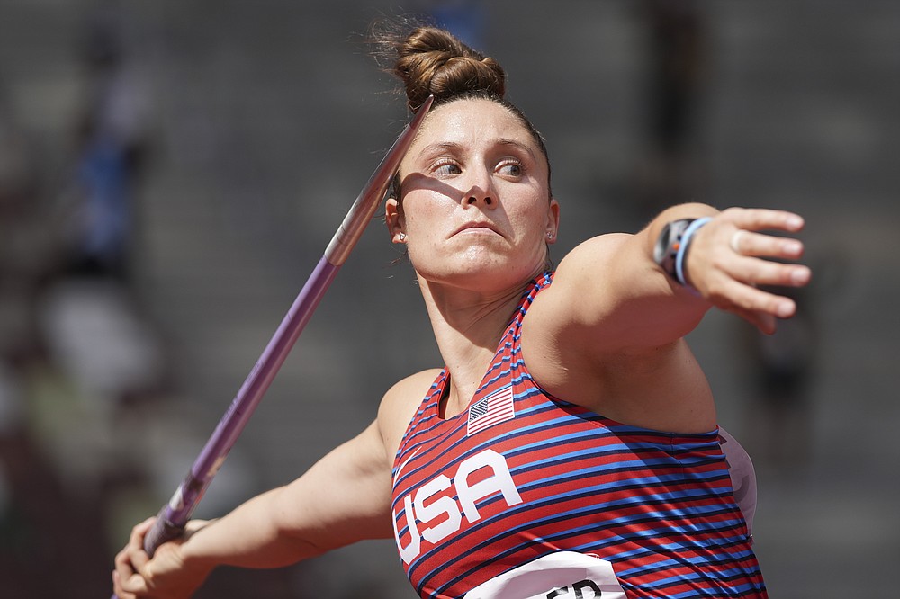 Kara Winger, of United States, competes in qualifications for the women's javelin throw at the 2020 Summer Olympics, Tuesday, Aug. 3, 2021, in Tokyo. (AP Photo/Matthias Schrader)