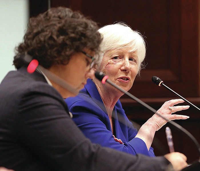 Cindy Gillespie (right), Secretary of the Arkansas Department of Human Services, answers a question during the Arkansas Legislative Council meeting on Monday, Aug. 9, 2021, at the state Capitol in Little Rock. 
(Arkansas Democrat-Gazette/Thomas Metthe)