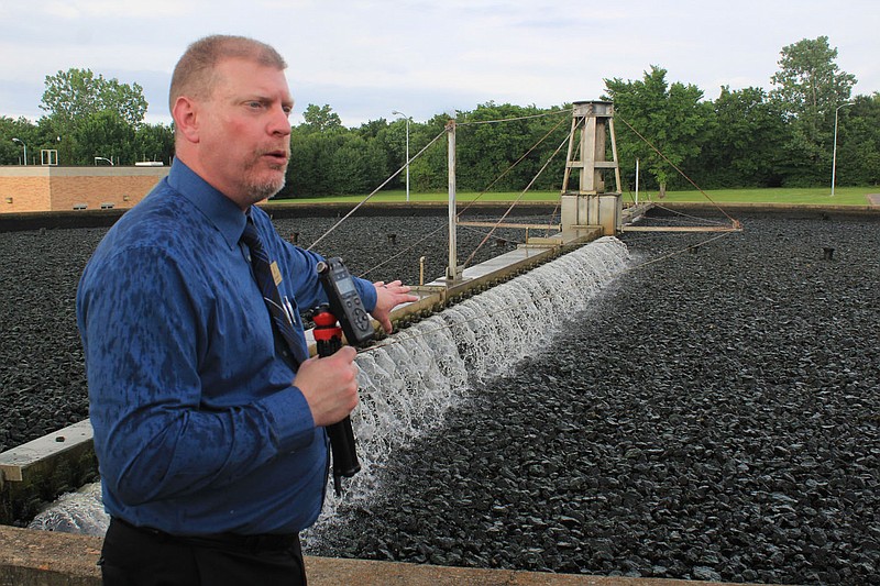 Utility director Lance McAvoy shows Fort Smith Board of Directors one of the failing trickling filters at the Massard Water Reclamation Facility on June 8.
(File Photo/NWA Democrat-Gazette/Max Bryan)