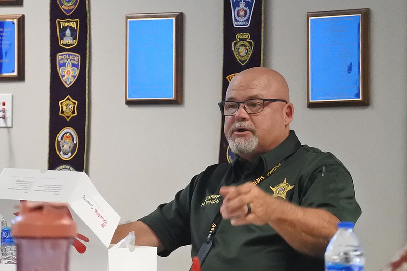 Sebastian County Sheriff Hobe Runion speaks during the Sebastian County Criminal Justice Coordinating Committee meeting at the Fort Smith Police Department on Thursday. 
(NWA Democrat-Gazette/Thomas Saccente)
