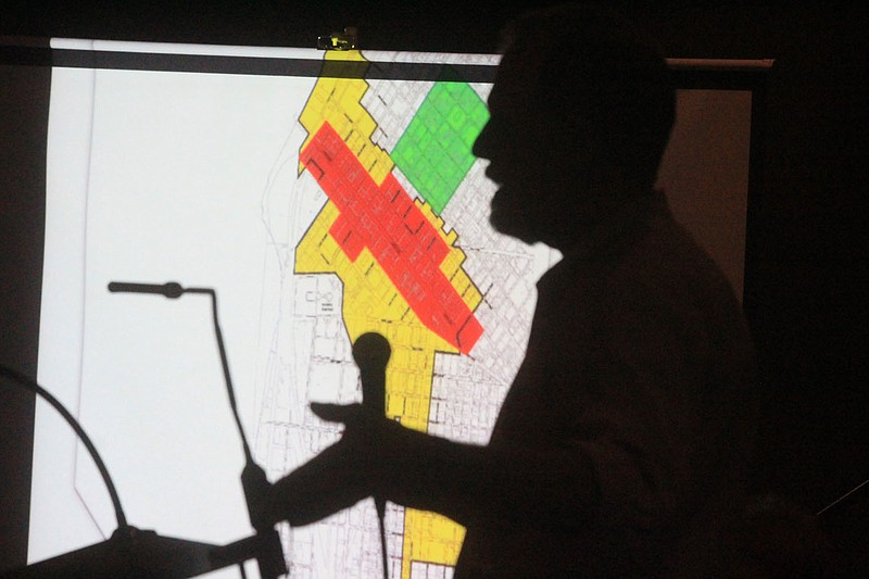 Central Business Improvement District chairman Bill Hanna speaks at a panel on the district's proposed property assessment Wednesday, Aug. 11, 2021, at The Blue Lion in Fort Smith.