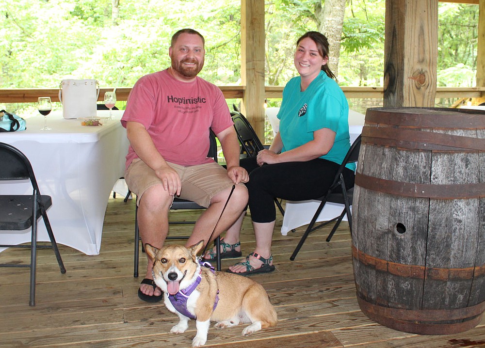 Evan and Mekenzie Wilkerson, with Koala, attend Dog Days of Summer.
(NWA Democrat-Gazette/Carin Schoppmeyer)