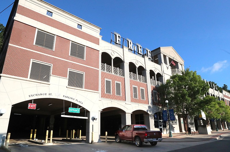 The city plans to convert free parking in the Exchange Street Parking Plaza to paid spaces, generating revenue that could finance the construction of parking improvements. - Photo by Richard Rasmussen of The Sentinel-Record