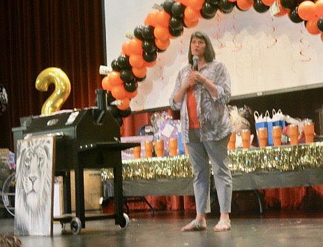 Westside Eagle Observer/SUSAN HOLLAND 
Superintendent of schools Maribel Childress welcomes faculty members at Gravette schools to the teacher appreciation event held Friday, August 13, in the Performing Arts Center at Gravette High School.