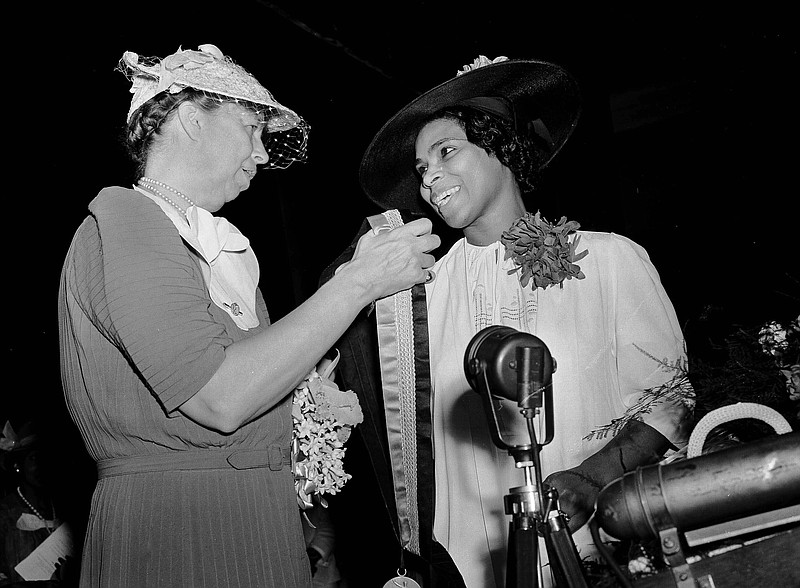 First lady Eleanor Roosevelt appears with Marian Anderson in Richmond, Va., July 2, 1939, as Anderson is presented with the Spingarn Medal. (AP File Photo)