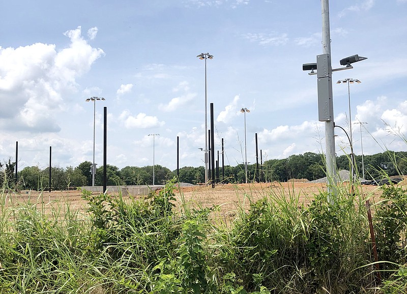 Westside Eagle Observer/RANDY MOLL
Electrical work and light poles are going up at the new sports complex being built along Browning Road on the north side of Gentry.
