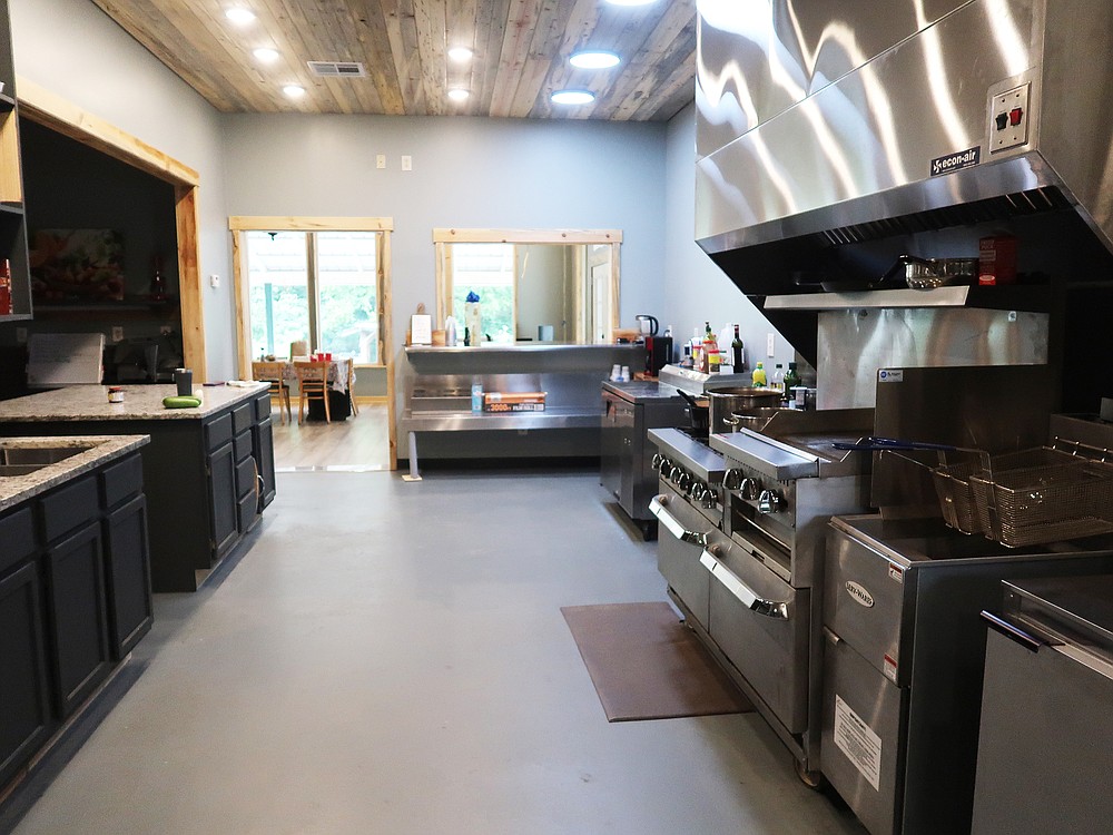 The professional kitchen at Urbana Farmstead produces prepared foods for the farm store and hosts classes in cooking and preserving herbs and vegetables. (Special to the Democrat-Gazette/Janet B. Carson)