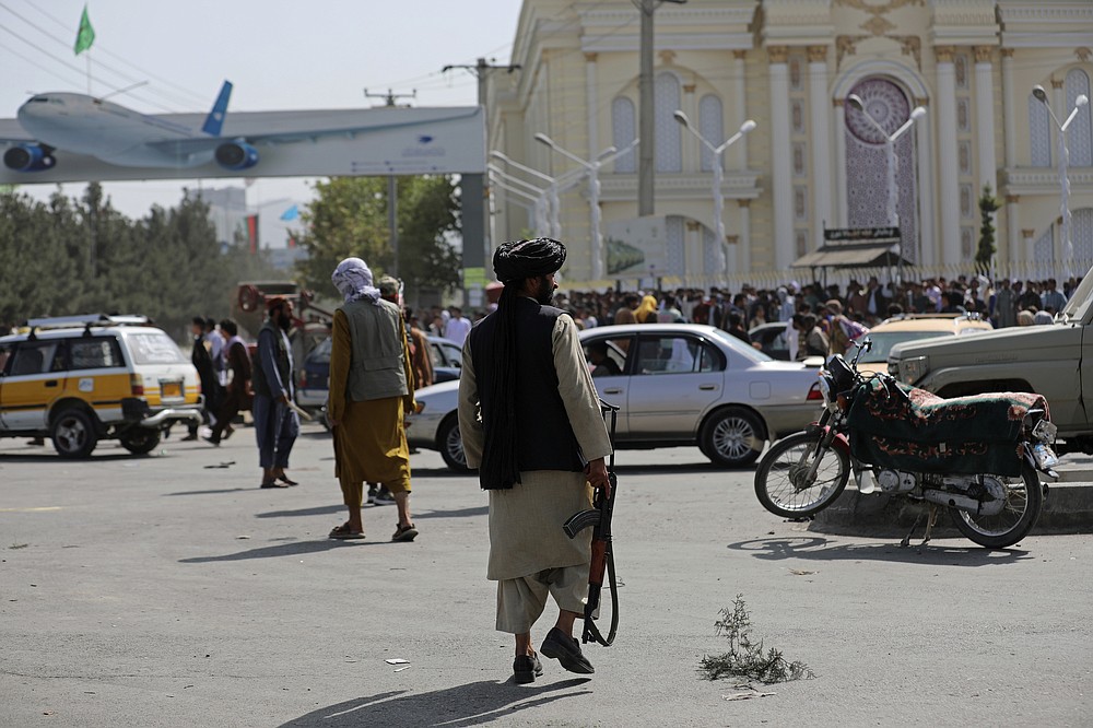 Kabul Airport Plunges Into Chaos As Taliban Patrols Capital