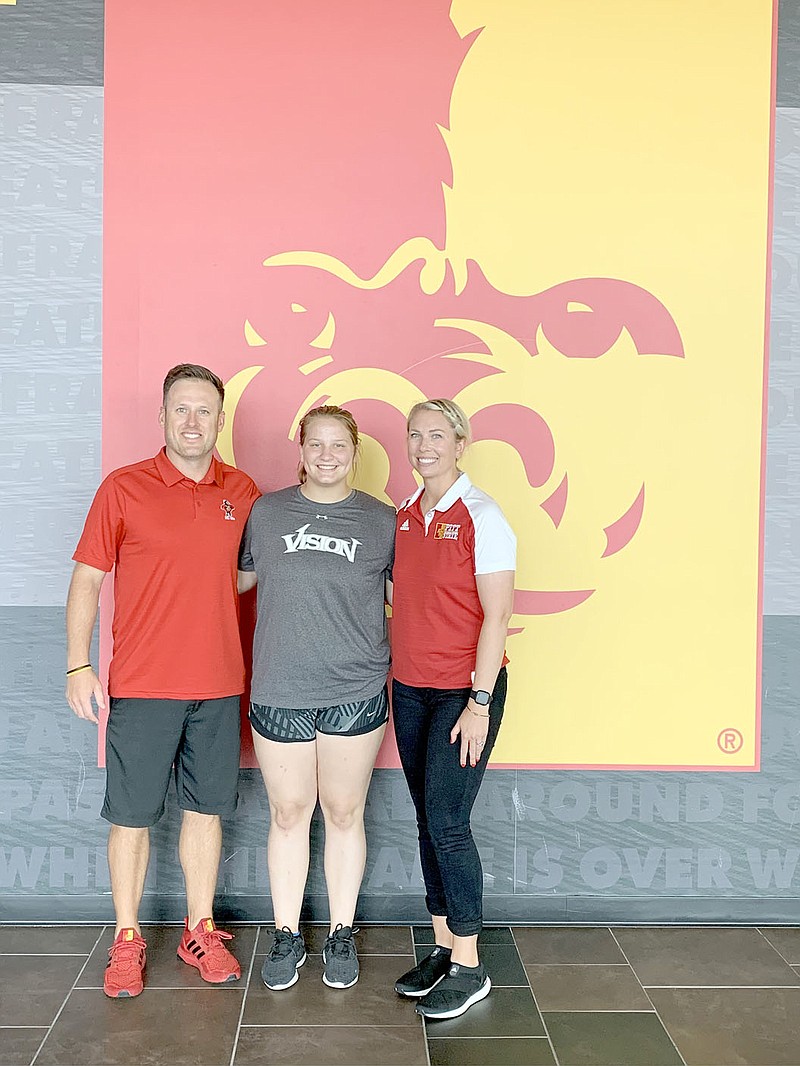 SUBMITTED PHOTO
Madeline McCall (middle) poses with Pittburg State softball head coach Jenny Fuller, (right) and assistant Brad Fuller (left).