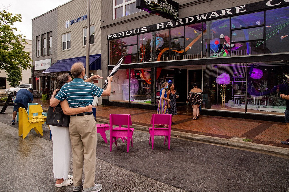 Curator Dayton Castleman of Verdant Studio says exhibitions at Famous Hardware have to be big enough and attractive enough to bring visitors up to the massive two-story windows.
(Courtesy Photo/Downtown Springdale Alliance and Meredith Mashburn)