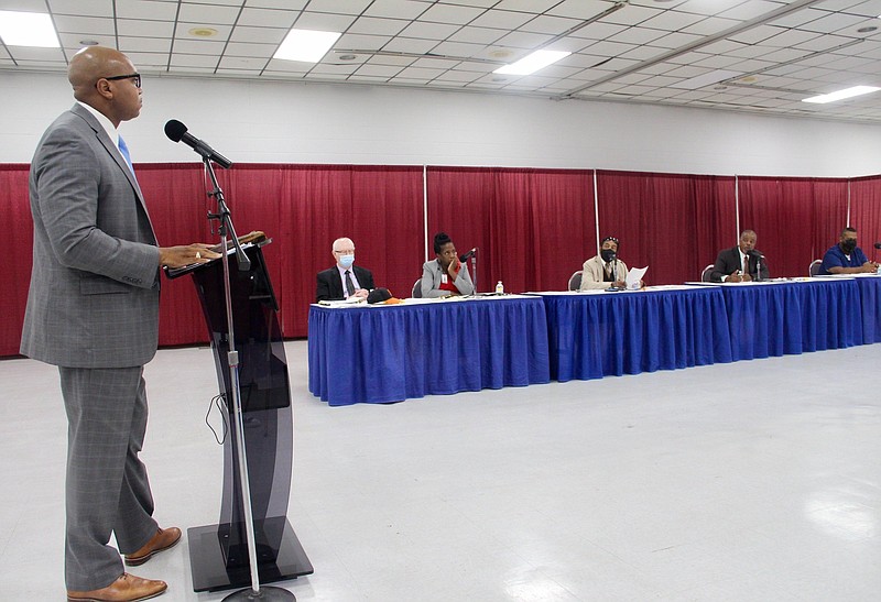 Go Forward Pine Bluff CEO, Dr. Ryan Watley listens Monday to council members discuss a resolution in support of a development at Sixth Avenue and Main Street. (Pine Bluff Commercial/Eplunus Colvin)