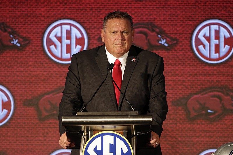 FILE - Arkansas head coach Sam Pittman speaks to reporters during an NCAA college football news conference at the Southeastern Conference media days in Hoover, Ala., in this Thursday, July 22, 2021, file photo. Arkansas is feeling good about coach Sam Pittman after last season&#x2019;s 3-7 campaign produced much more competitive football than in recent years. (AP Photo/Butch Dill, File)