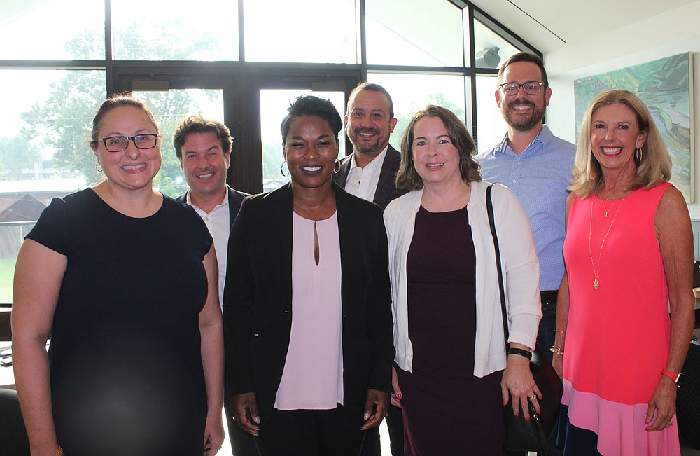 Christina Ruggiero (from left), Andres Mejia, Pamela Stewart, Joseph Vizcarra, Julie Reilman, Dan Grover, Sally Hargis attend the Bentonville Film Fesitval opening reception.
(NWA Democrat-Gazette/Carin Schoppmeyer)