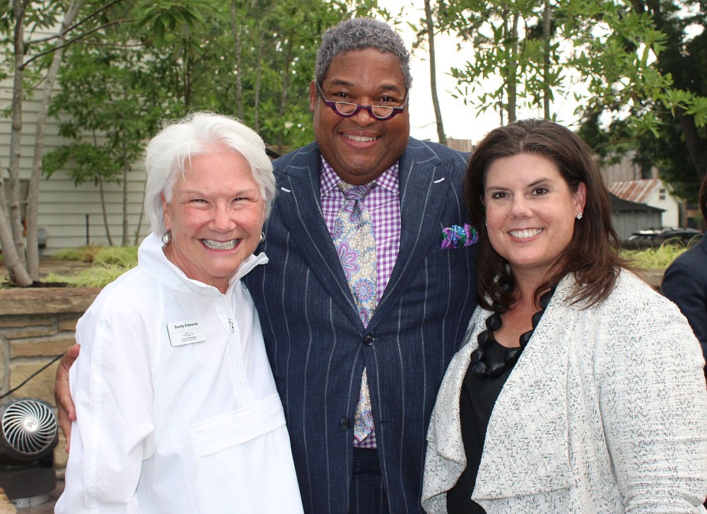 Sandy Edwards (from left), Tony Waller and Jill Wagar visit at the BFF opening reception.
(NWA Democrat-Gazette/Carin Schoppmeyer)