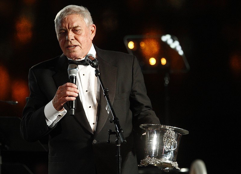 In this Tuesday, Oct. 30, 2012, file photo, Tom T. Hall accepts the Icon Award at the 60th Annual BMI Country Awards in Nashville, Tenn. Singer-songwriter Hall, who composed “Harper Valley P.T.A.” and sang about life’s simple joys as country music’s consummate blue collar bard, has died. He was 85. His son, Dean Hall, confirmed the musician's death Friday at his home in Franklin, Tennessee. - Photo by Wade Payne/Invision/AP