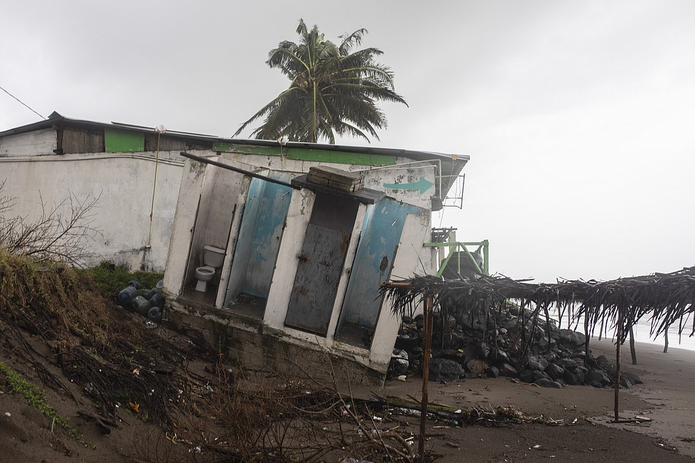 A home damaged by winds brought on by Hurricane Grace sits askew near the shore, in Tecolutla, Veracruz State, Mexico, Saturday, Aug. 21, 2021. Grace hit Mexico&#x2019;s Gulf shore as a major Category 3 storm before weakening on Saturday, drenching coastal and inland areas in its second landfall in the country in two days. (AP Photo/Felix Marquez)