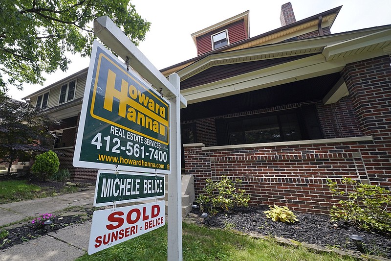 This is a sold sign outside a house in Mt. Lebanon, Pa, on Friday, June 25, 2021. (AP Photo/Gene J. Puskar)