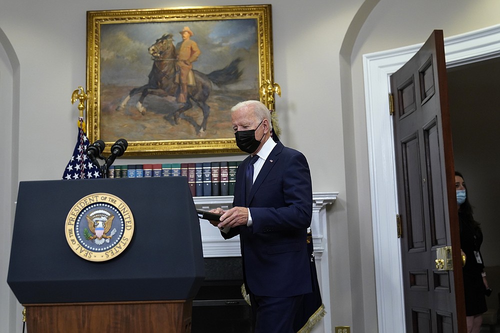 President Joe Biden arrives to speak about the situation in Afghanistan in the Roosevelt Room of the White House, Sunday, Aug. 22, 2021, in Washington. (AP Photo/Manuel Balce Ceneta)