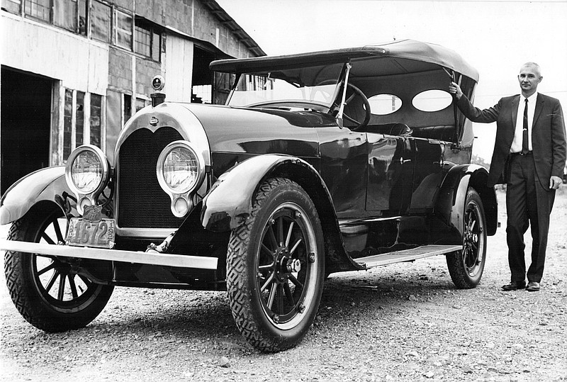 Atley Davis and his elegant Climber, made in Little Rock in the 1920s, photographed by Arkansas Gazette photographer Larry Obsitnik on Aug. 13, 1964. Davis restored the antique car, and it was one of more than 200 vintage vehicles that paraded and competed during the opening ceremonies of the Museum of Automobiles at Petit Jean in October 1964. The museum acquired the Climber in the 1970s and another model Davis also had restored, too.
(Democrat-Gazette file photo)