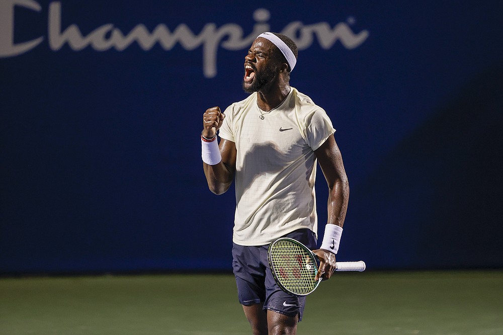 Frances Tiafoe, of the United States, reacts after winning a point in the second-set tiebreaker against Thiago Monteiro, of Brazil, at the Winston-Salem Open tennis tournament in Winston-Salem, N.C., Wednesday, Aug. 25, 2021. (AP Photo/Nell Redmond)