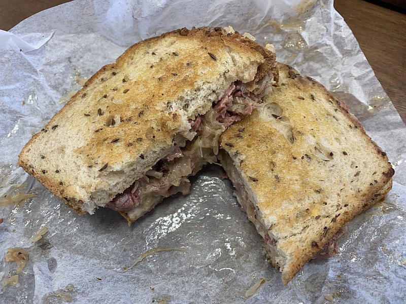 Our Reuben from Slick’s was sloppy but delicious. (Arkansas Democrat-Gazette/Eric E. Harrison)