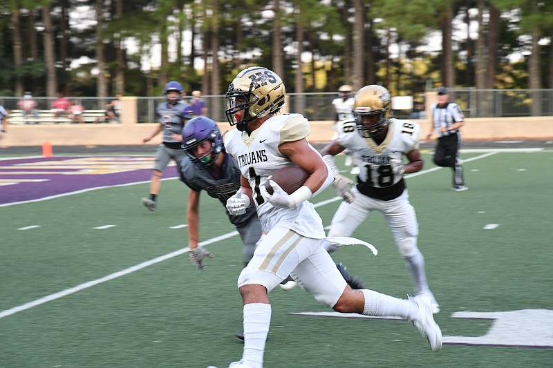 Hot Springs' Pierce Smalley (1) makes his way into the end zone to score a touchdown against Fountain Lake Thursday at Allen Tillery Field. The Trojans won 52-7. - Photo by Tanner Newton of The Sentinel-Record