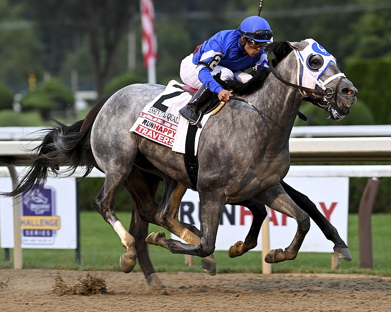 Essential Quality, with jockey Luis Saez, wins the Travers Stakes Saturday at Saratoga Race Course in Saratoga Springs, N.Y. - Photo by Adam Coglianese/New York Racing Association via The Associated Press