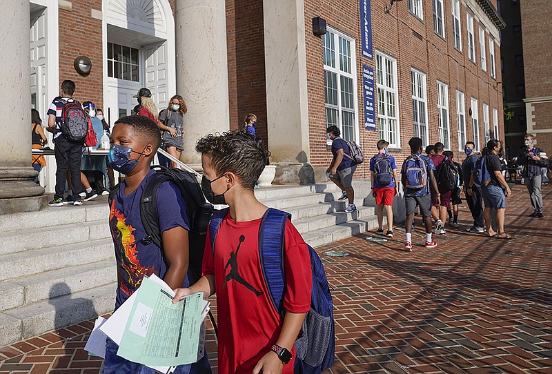 U.S. probes 5 states' school maskrule bans The Arkansas Democrat