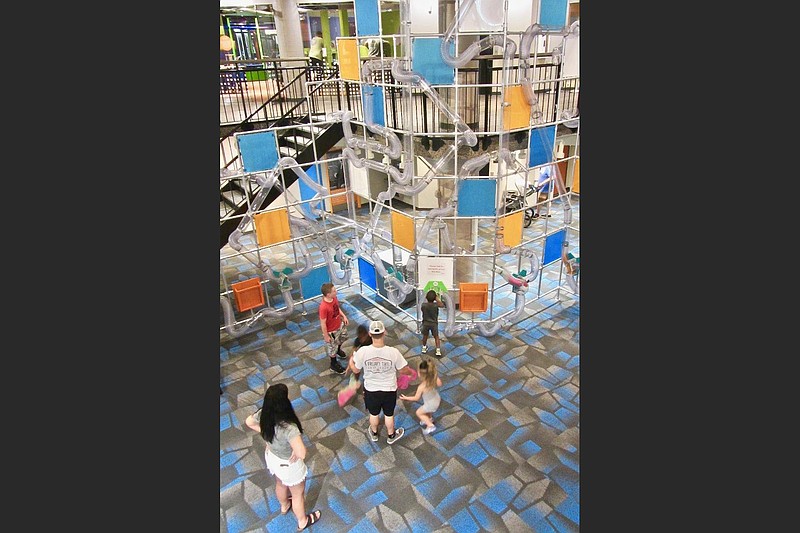 The Museum of Discovery’s Whoosh tower is a popular attraction. (Marcia Schnedler/Special to the Democrat-Gazette)