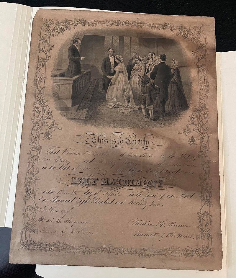 A New Jersey marriage certificate dated April 11, 1872, was found hidden behind a large picture frame that was donated to a North Carolina thrift shop in late July. (MUST CREDIT: Photo courtesy of Karmen Smith)