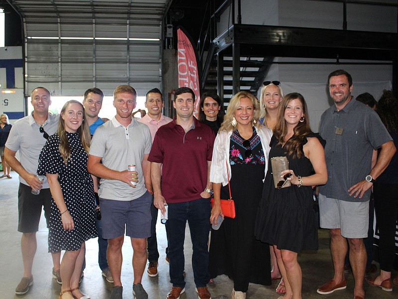 Representatives of The Hershey Company help support the Boys &amp; Girls Club of Benton County at Sip &amp; Savor on Aug. 19 in Rogers.
(NWA Democrat-Gazette/Carin Schoppmeyer)