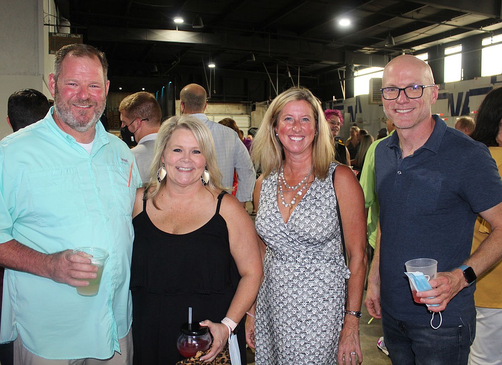 Brian and Cheryl Yarbrough (from left) and Nicki Kappler and Kenneth Medlin attend Sip & Savor.
(NWA Democrat-Gazette/Carin Schoppmeyer)